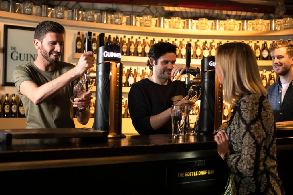 Learning to pour a pint of Guinness at the Guinness Storehouse